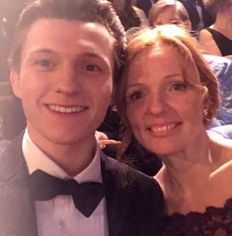 Nicola Elizabeth Frost with her son Tom Holland.